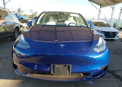 2025 Tesla Model Y Long Range Dual Motor Rear-Wheel Drive z USA, uszkodzony, nr VIN 7SAYGDED4SF256344